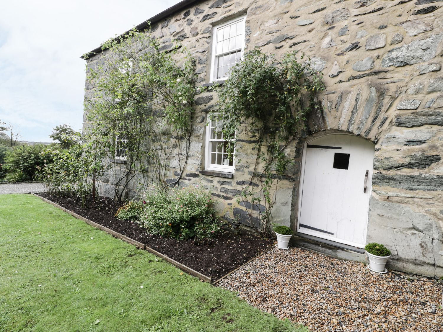 Bwthyn Canol from Sykes Holiday Cottages. Bwthyn Canol is in Llanfair