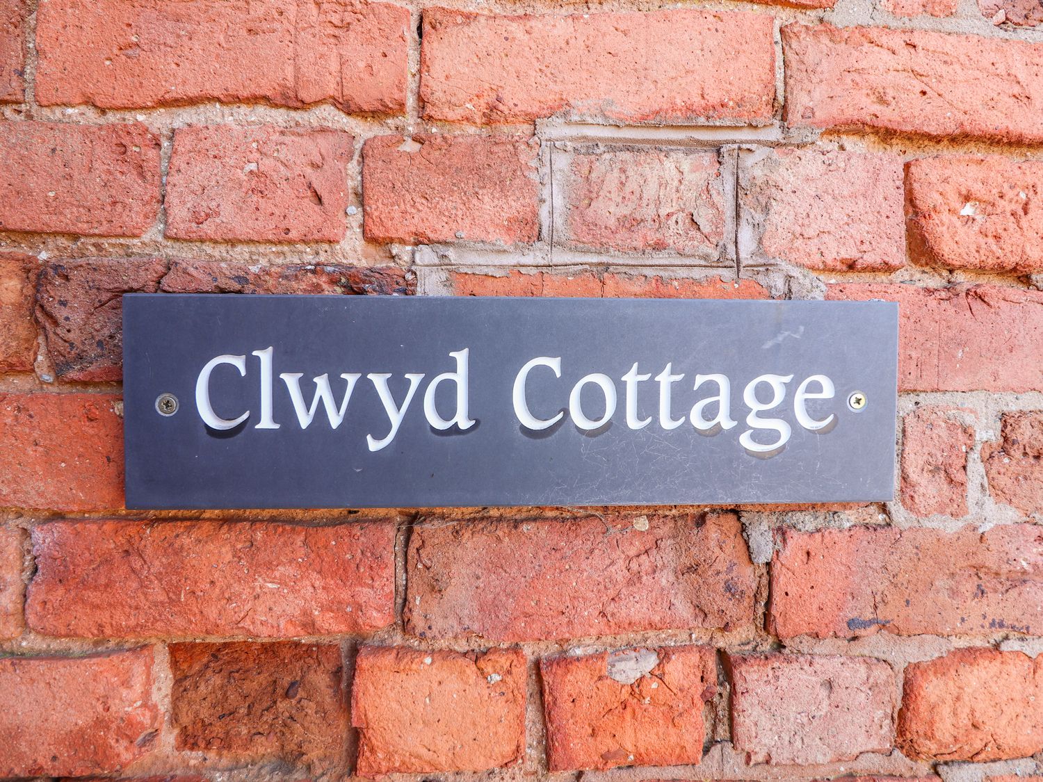 Clwyd Cottage from Sykes Holiday Cottages. Clwyd Cottage is in St Asaph Pet Friendly with hot