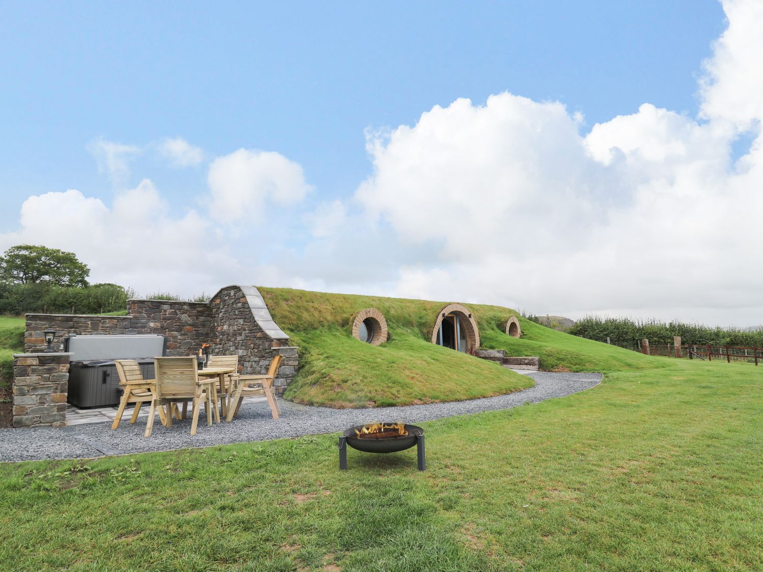 Hobbit Home 2 from Sykes Holiday Cottages. Hobbit Home 2 is in Llanfair
