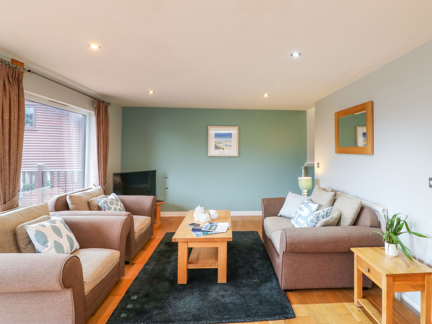 Lodge Sixty Six from Sykes Holiday Cottages. Lodge Sixty Six is in St